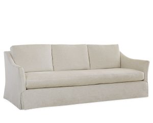Elegant white sofa featured as part of a living room interior design.