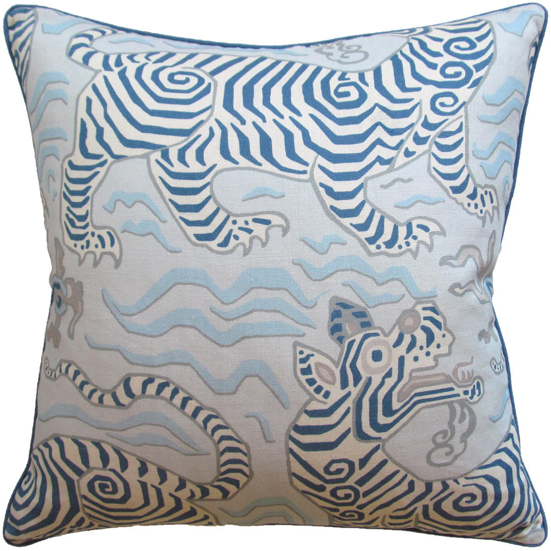The boho chic Tibet Pillow in shades of blue with a tiger print design