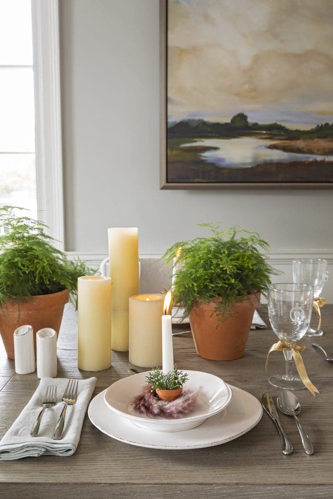 Holiday Tablescape Ideas by Mt Pleasant furniture store GDC — assorted candles decorating the table