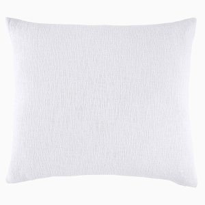 white textured woven pillow