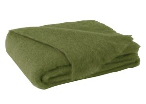 green bedding blanket and throw