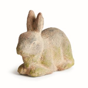 weathered garden rabbit as an outdoor decorative object