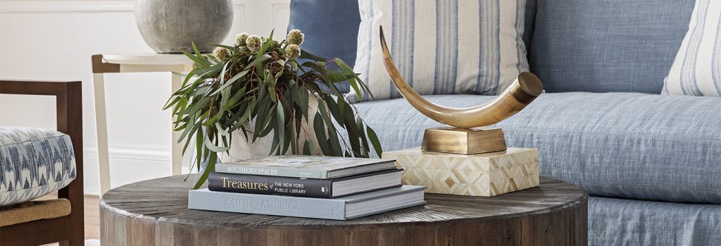 Interior design Mount Pleasant space styled with Charleston home decor and custom seating. Stylish home lighting and décor paired with decorative objects from Mount Pleasant furniture and lighting stores.