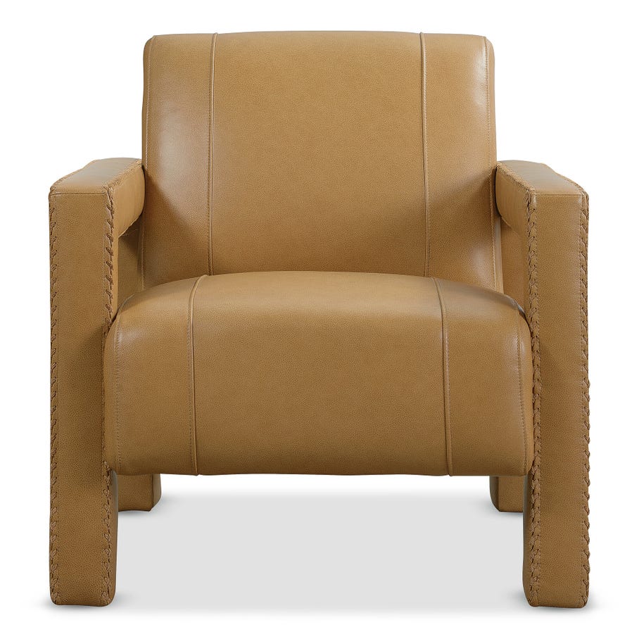 front view of a tan leather upholstered armchair with sturdy arms and detailed stitching