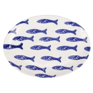 Santorini small fish oval platter from a Charleston home decor store with a selection of decorative objects, tabletop pieces, and Charleston home decor