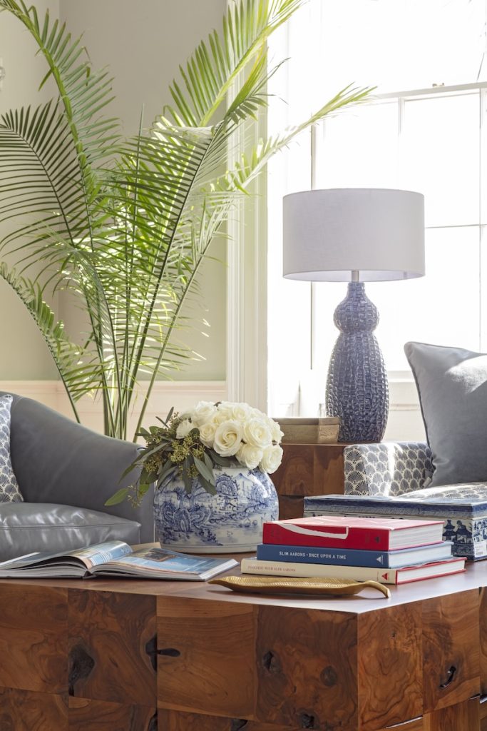 Layered greenery and natural plants styled with home décor and furniture at GDC Home, best furniture store in Charleston, SC