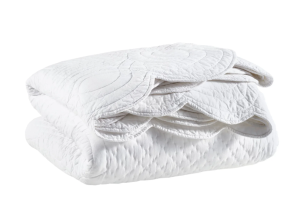 Scalloped bedding blankets and throws from a Charleston home decor store