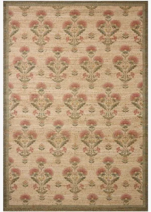 flatweave natural rug with a multicolored floral pattern continued throughout. the border is a sage green.