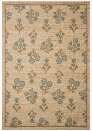 flatweave natural rug with blue toned floral pattern continued throughout
