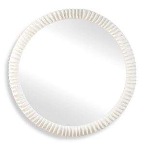 Round, white, matte ceramic mirror. A natural nautical look similar to seashells with its ruffled edges.