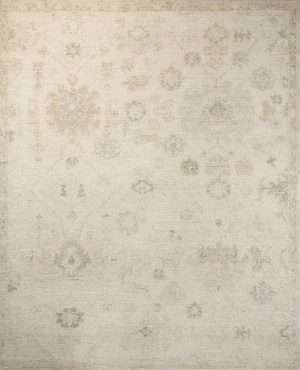 An area rug with subtle asymmetrical motifs in a neutral color palette