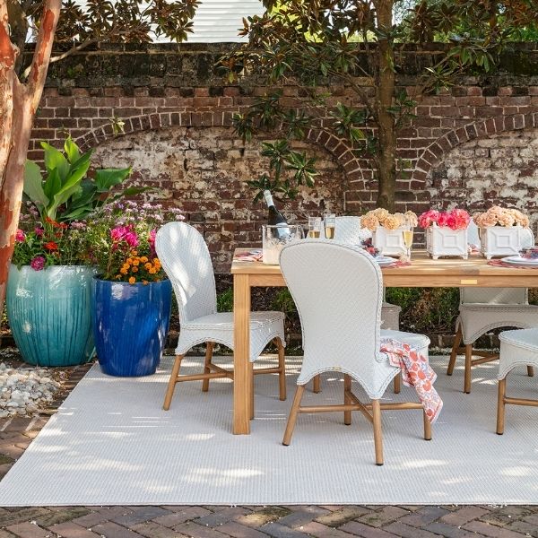 The De Janeiro Champagne Indoor/Outdoor Rug, a neutral outdoor rug for small outdoor living spaces, from GDC Home's selection of rugs Charleston SC