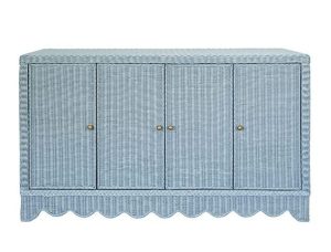 Scalloped sideboard for storage. Made of woven rattan with a braided accent on the base. Four doors and gold knobs