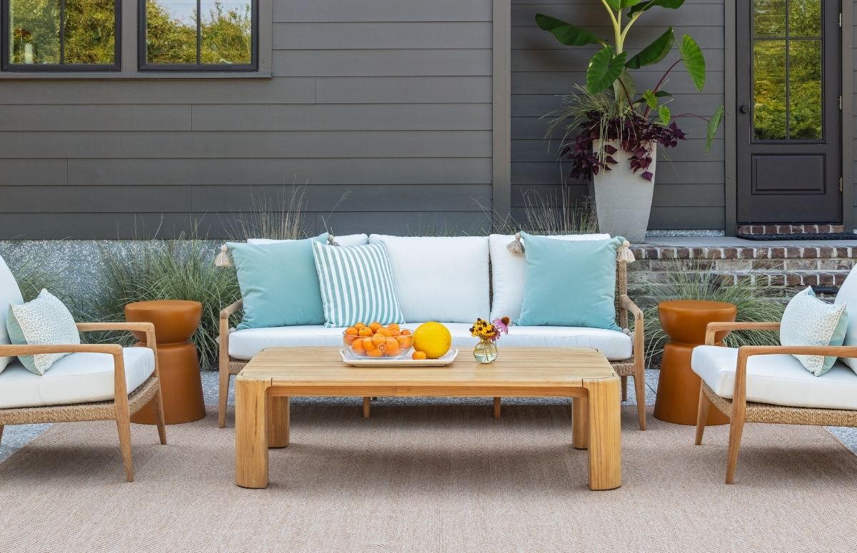 Patio furniture setup displaying a small outdoor space idea, styled with pieces from GDC Home's furniture stores Charleston SC