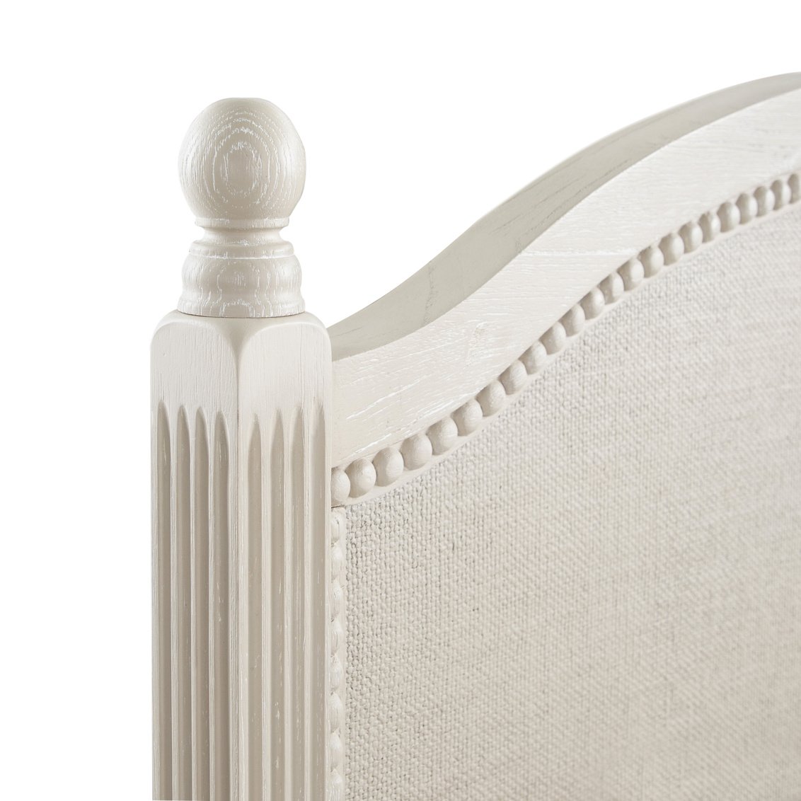 Detail of bed, cerused white finish with painted burlap panels. Sold by GDC Home in Charleston, SC