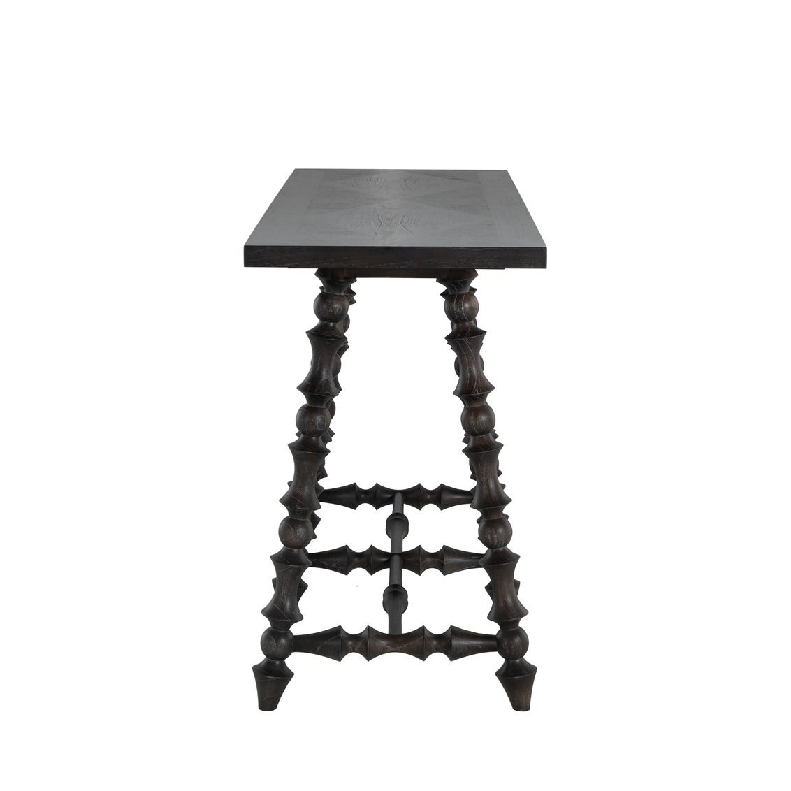 Side view of console, intricately turned legs, dark finish. Sold by GDC Home in Charleston, SC