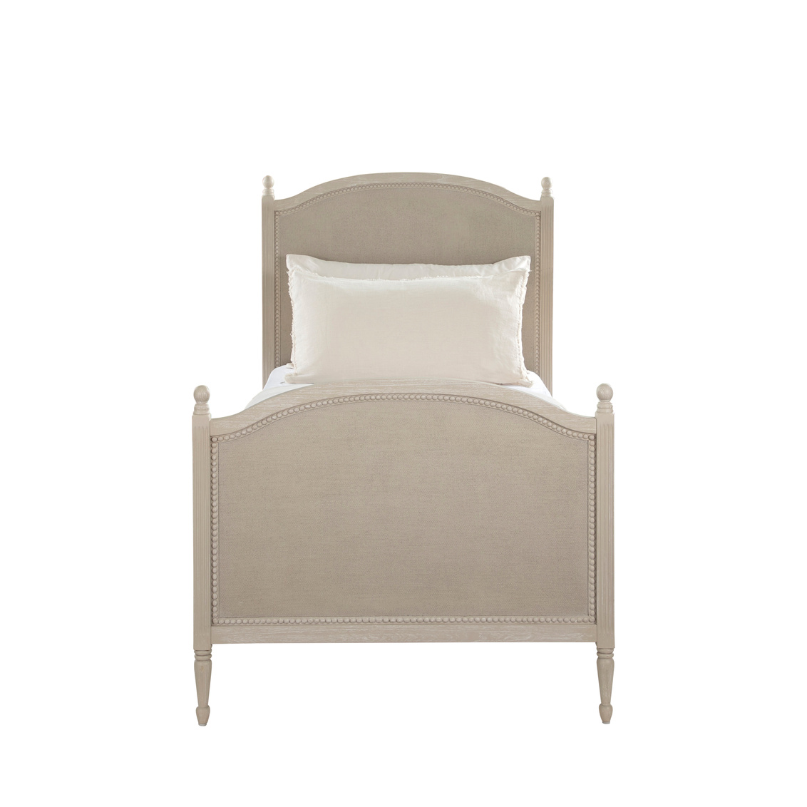 Front view of twin bed in cerused white finish with painted burlap panels. Sold by GDC Home in Charleston, SC