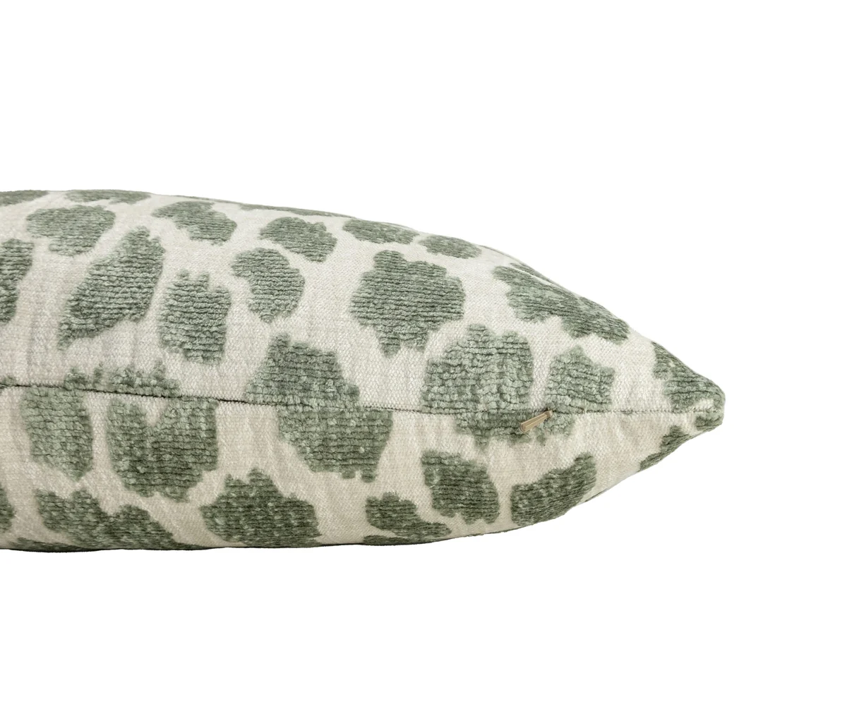 detail of light sage green chenille animal print decorative pillow