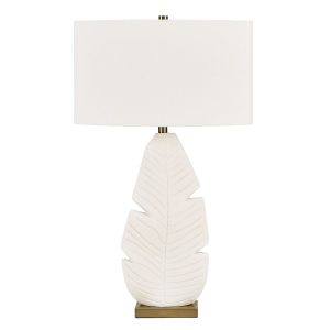 table lamp with textured palm leaf motif and white shade
