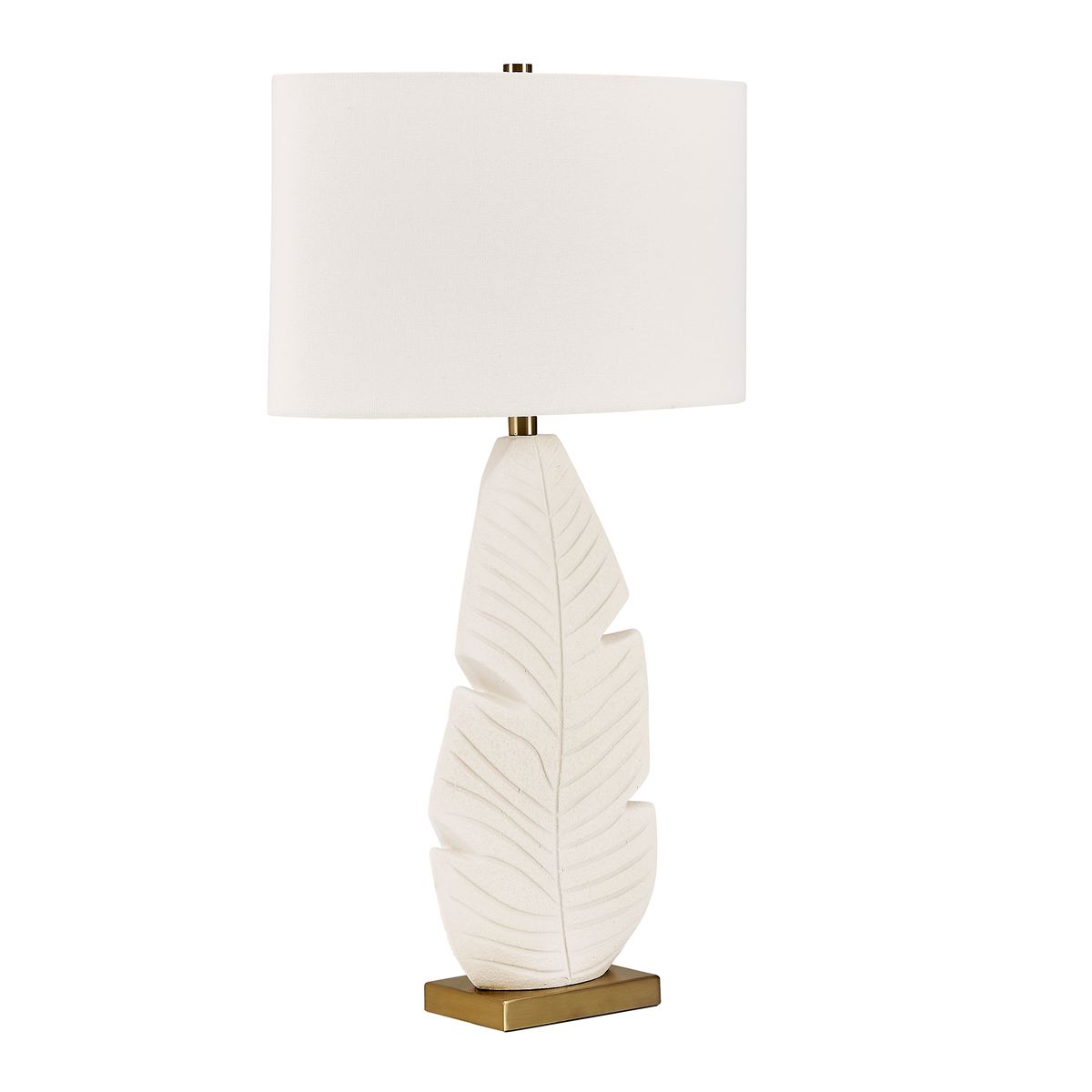 table lamp with textured palm leaf motif and white shade
