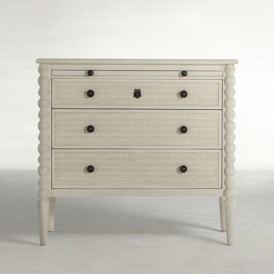 three drawer low profile dresser with linen front drawers in antique white finish, dark antique bronze hardware