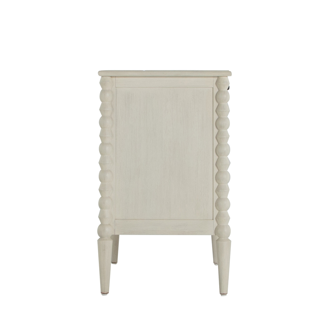 side view of three drawer low profile dresser in antique white finish