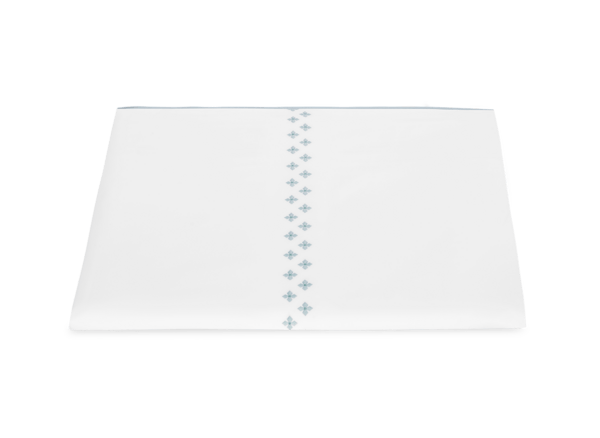 white duvet cover with pool embroidered Moroccan tilework design