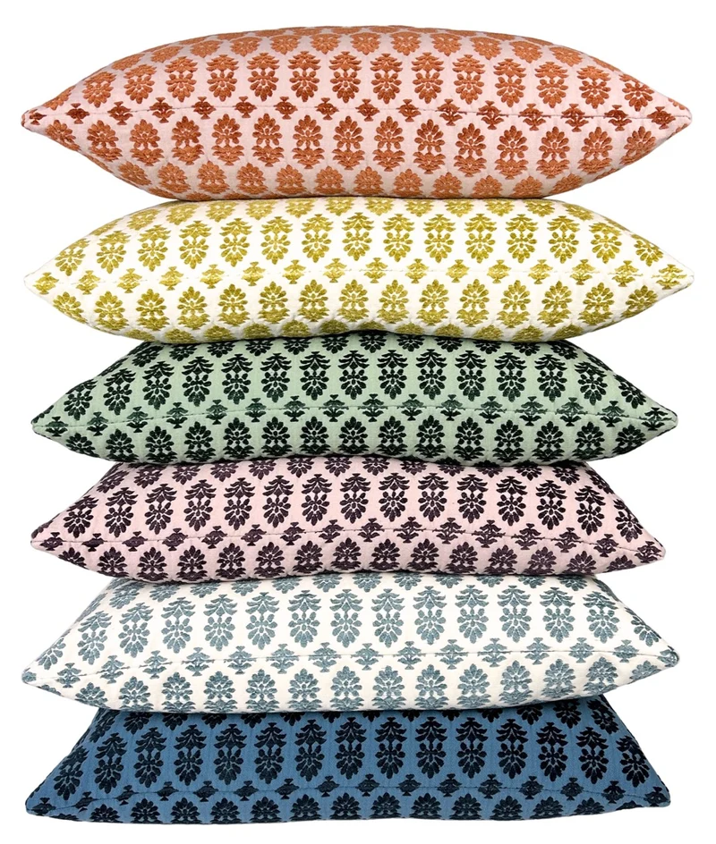 stack of six textured block print lumbar pillows