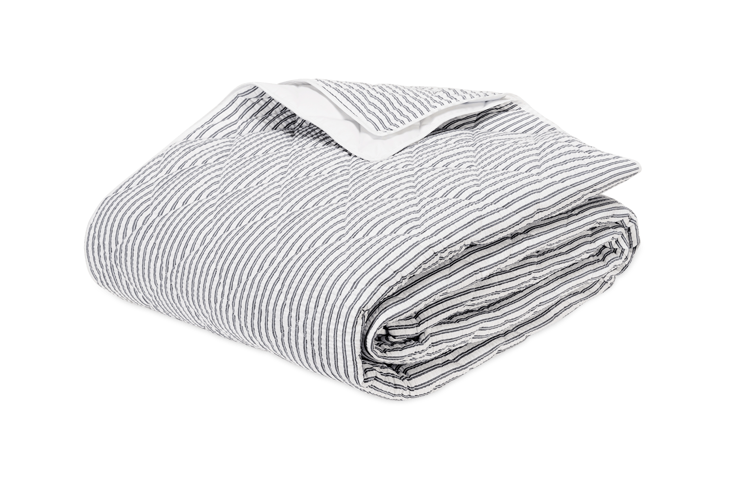 folded quilt in dark navy seersucker