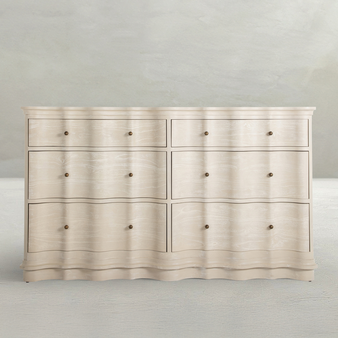 six drawer dresser with rippled facade in cerused white finish
