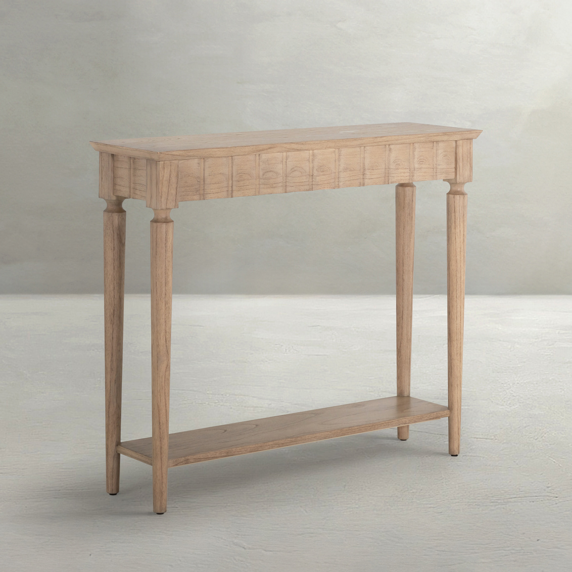 slim console with ribbed design in natural finish