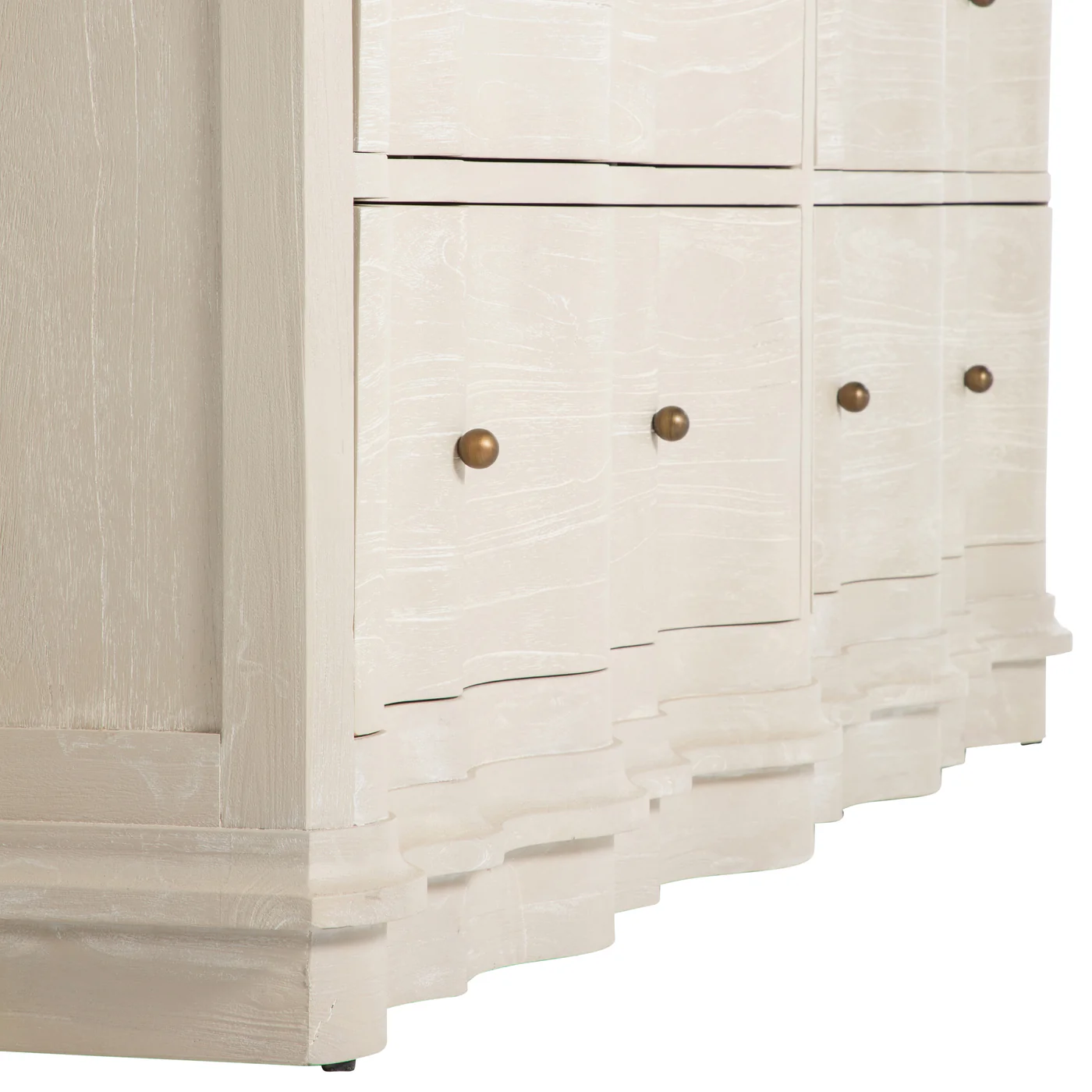 detail of six drawer dresser with rippled facade in cerused white finish