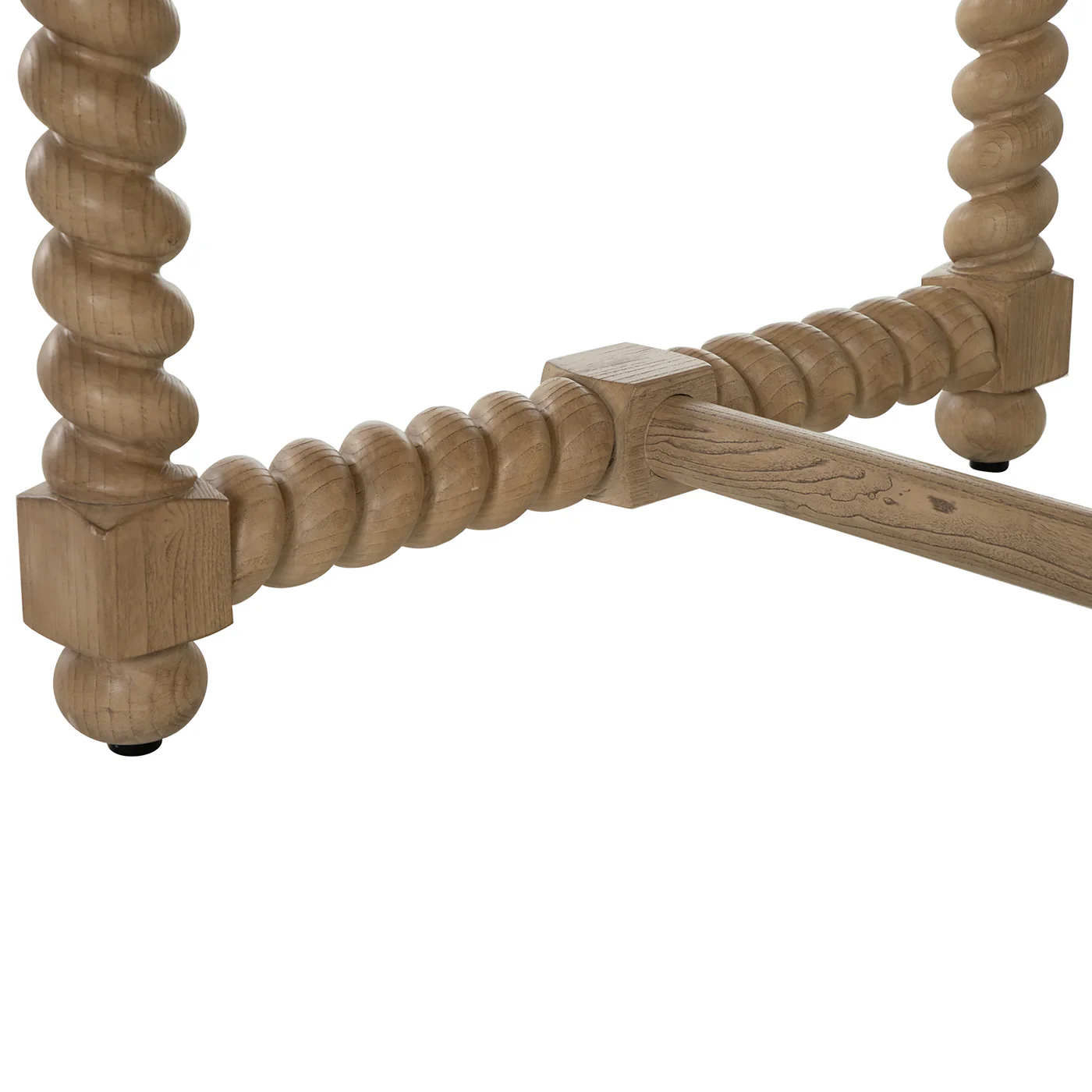 detaill of the legs of 84" dining table with turned legs in light blonde hue