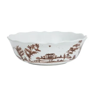 serving bowl with subtly ruffled rim and sepia hued harvest scene
