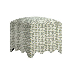 ottoman with scalloped base upholstered in green and aqua abstract floral pattern