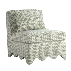 accent chair with scalloped base upholstered in green and aqua abstract floral pattern