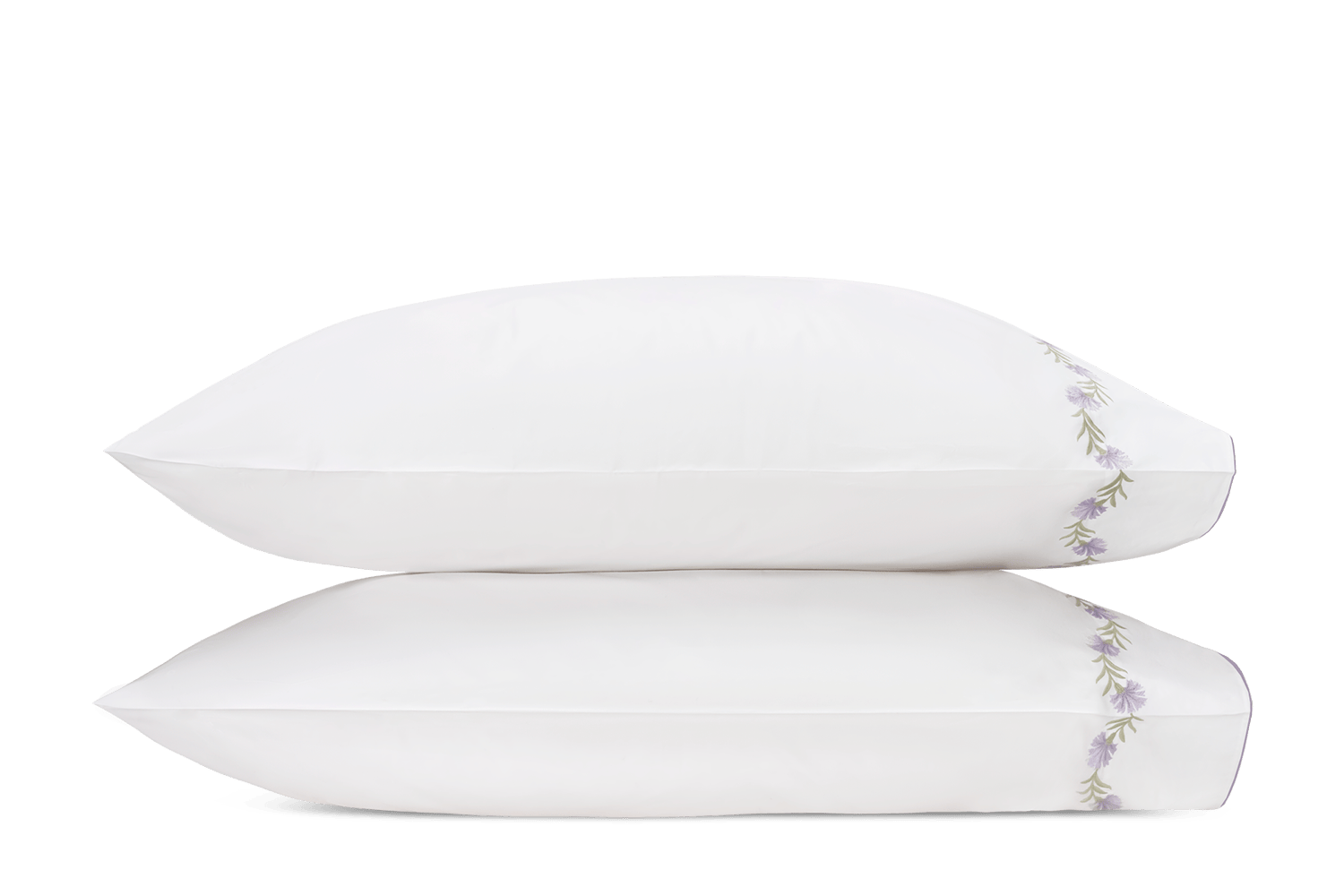 pair of white pillowcases with lilac floral vine embroidery