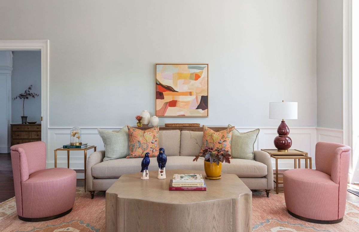 A living room furniture setup demonstrating how to style an accent chair featuring pieces from the best furniture stores Charleston has to offer, GDC Home
