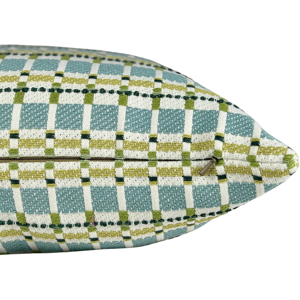 detail of aqua and green plaid throw pillow with woven windowpane pattern