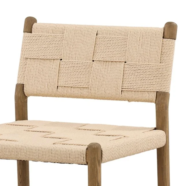 detail of a counter stool with wood frame and woven paper cord seat and back