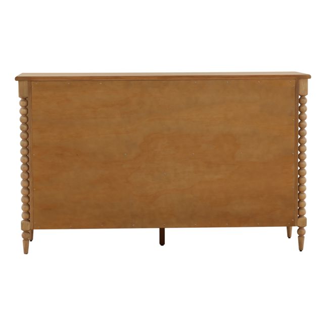 back view of a bobbin style dresser with six drawers in a natural finish