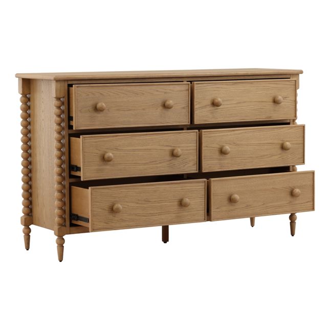 bobbin style dresser in natural finish shown with drawers opened
