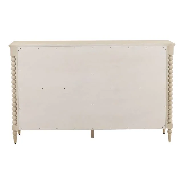 back view of a bobbin style dresser with six drawers in a whitewash finish