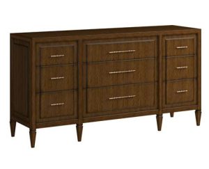 nine drawer dresser in warm walnut finish with elongated brass hardware