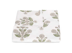folded white duvet with floral block print in muted olive green and taupe