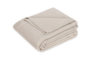 folded coverlet with woven small check pattern in taupe