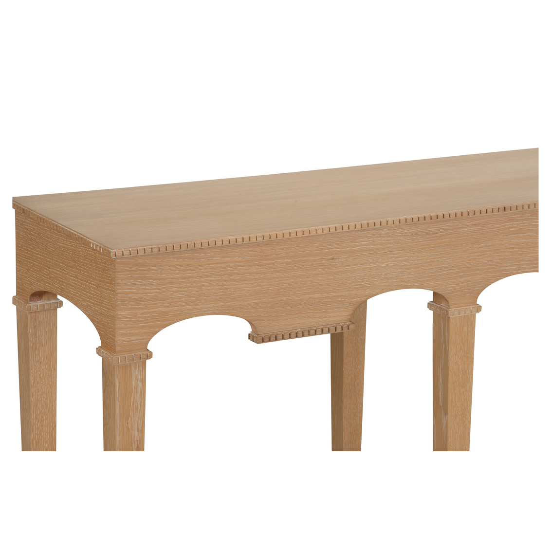 detail of cerused oak console with arched detail and subtle beaded molding