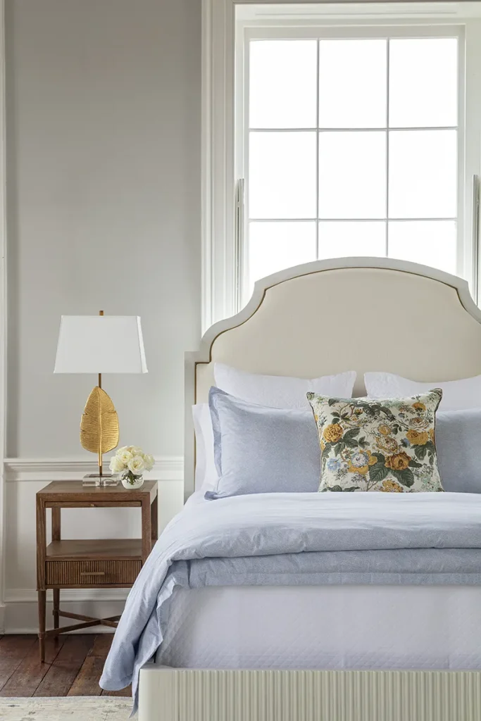 A Charleston bedroom design demonstrating how to style a bed through the changing seasons, with transitional bedding from our bedding stores in Mt Pleasant