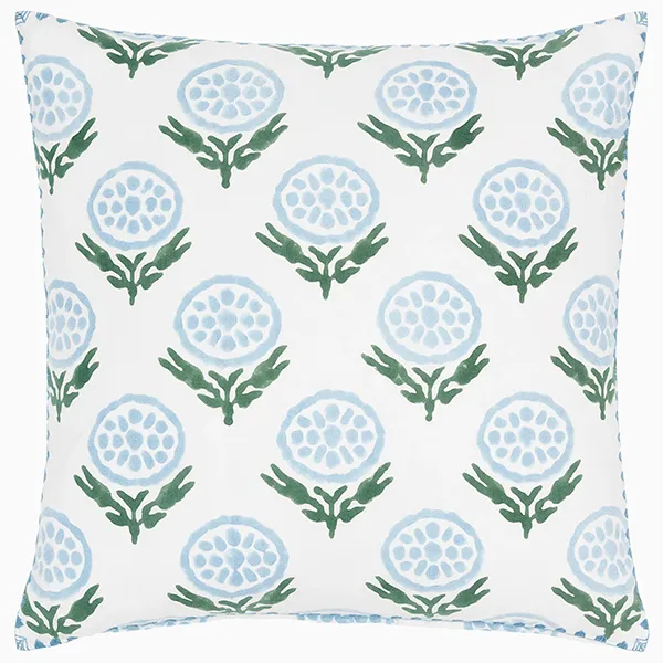 Coastal throw pillow with a blue pattern for bed styling